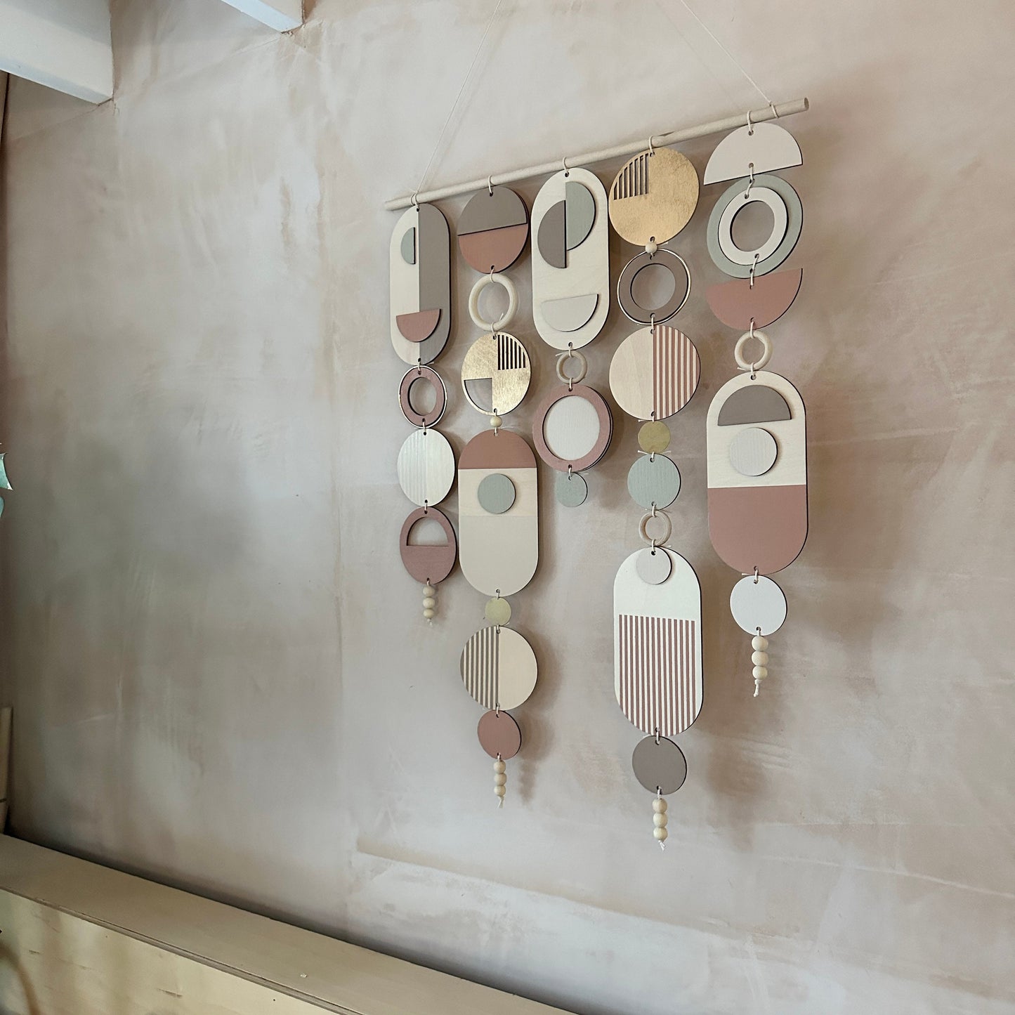 Modern Wall Art with Gold Metal Hoop Detailing and Blush Pink Accents