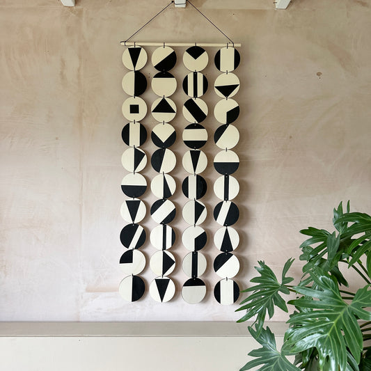 Black Geometric Pattern Wall Hanging - Modern Wall Art - Long Wall Art. Made from 40 discs of plywood measuring 125cm L x 47cm W