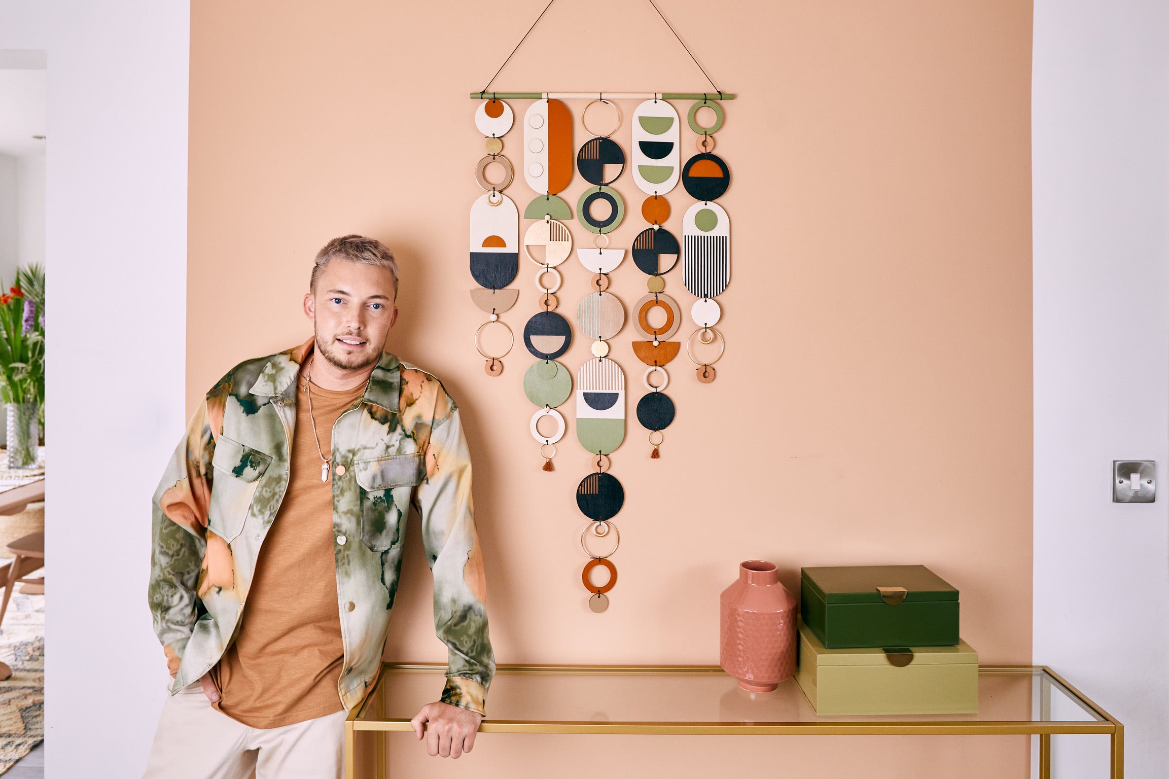 Artist Tim Stevenson pictured with the Etsy Design Award 2022 winning piece. 