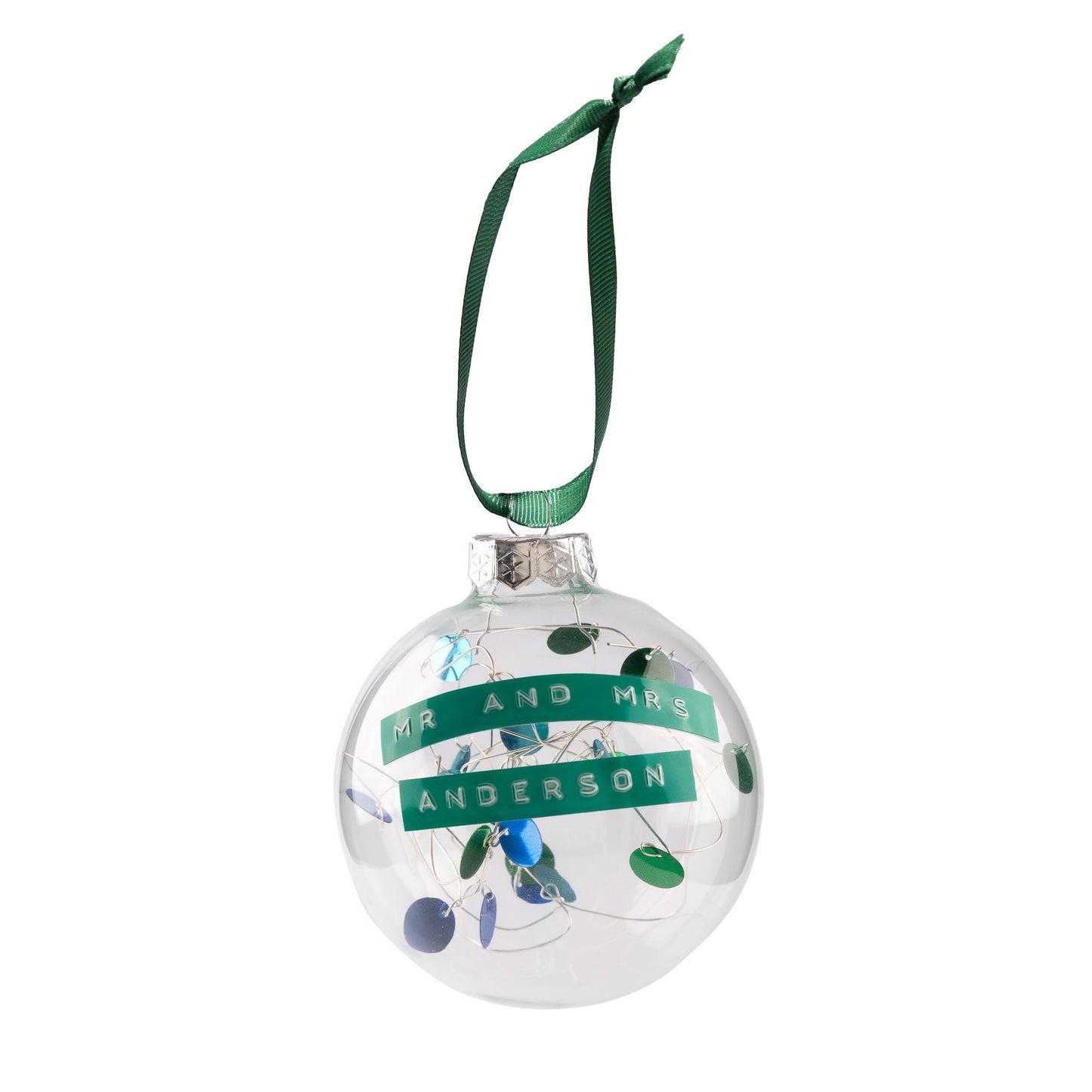 A glass bauble with green and blue sequins on silver wire with a green ribbon to hang it from. With a personalised message embossed on green tape.