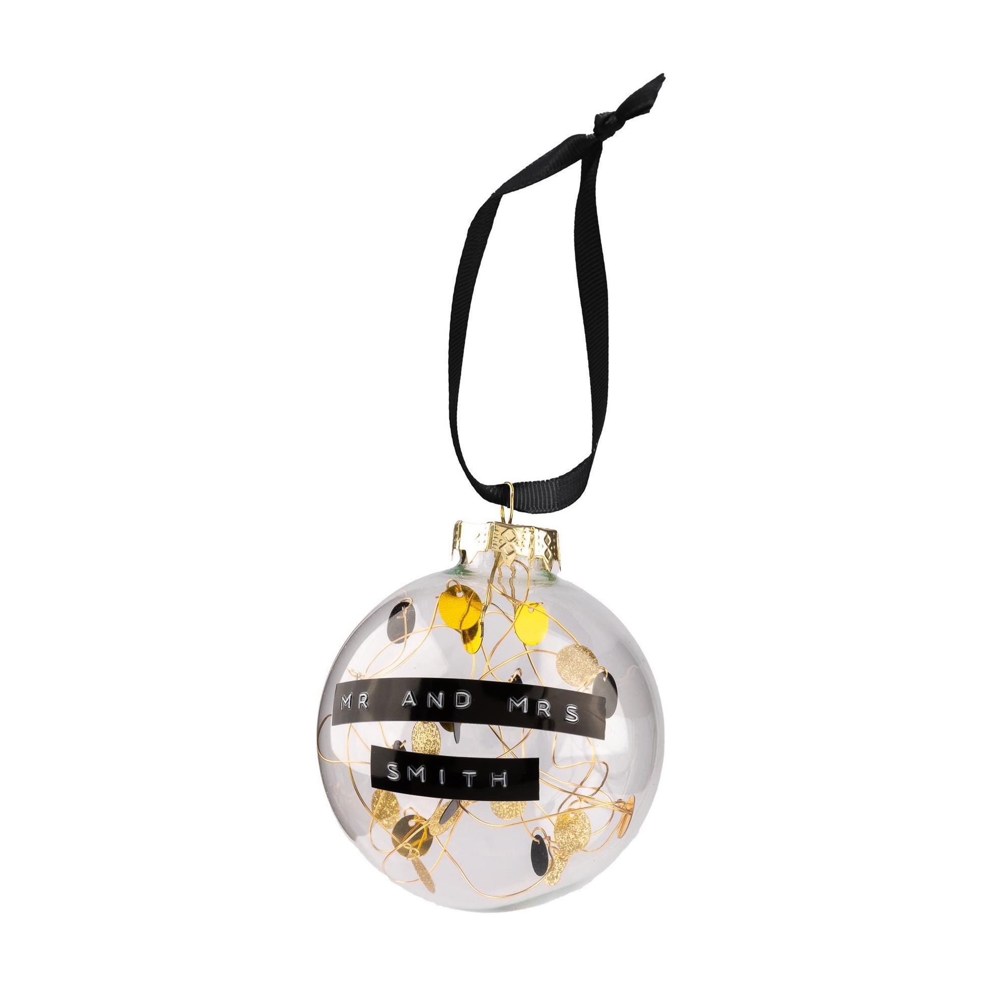 Glass baubles with gold, glitter gold and black sequins on gold wire inside with a black ribbon to hang it from. With a personalised message embossed on black tape.