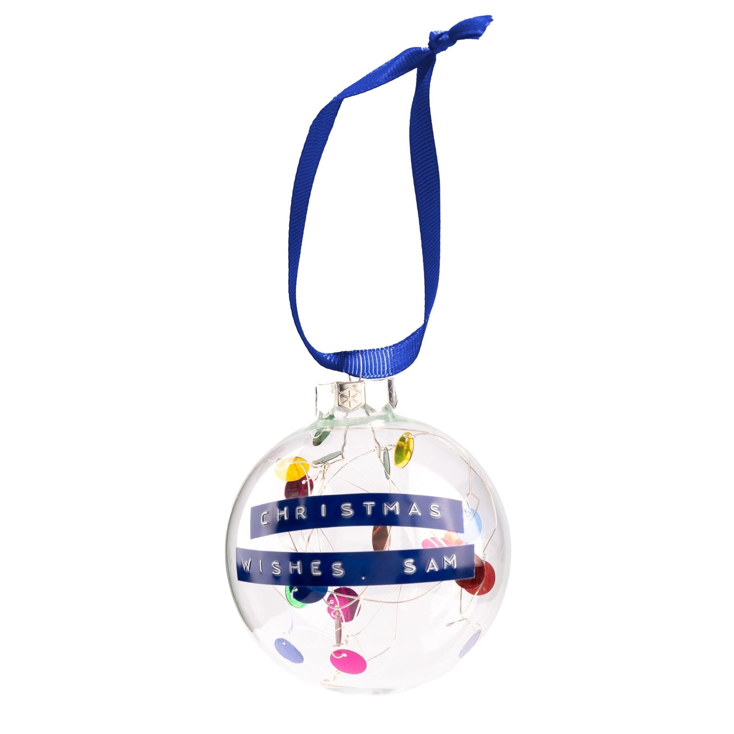 Glass baubles with a rainbow colour palette of sequins on silver wire inside with a blue ribbon to hang it from. With a personalised message embossed on blue tape.